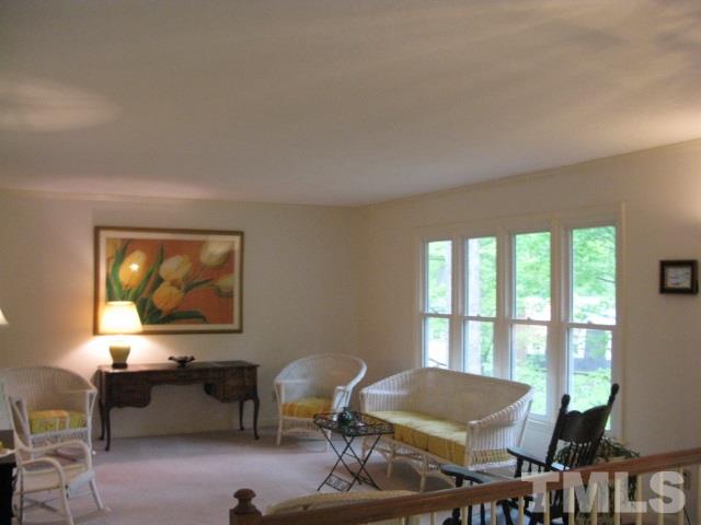 4201 Webster Court Raleigh, NC 27609 - Photo 2 of 25 a living room with furniture and a window