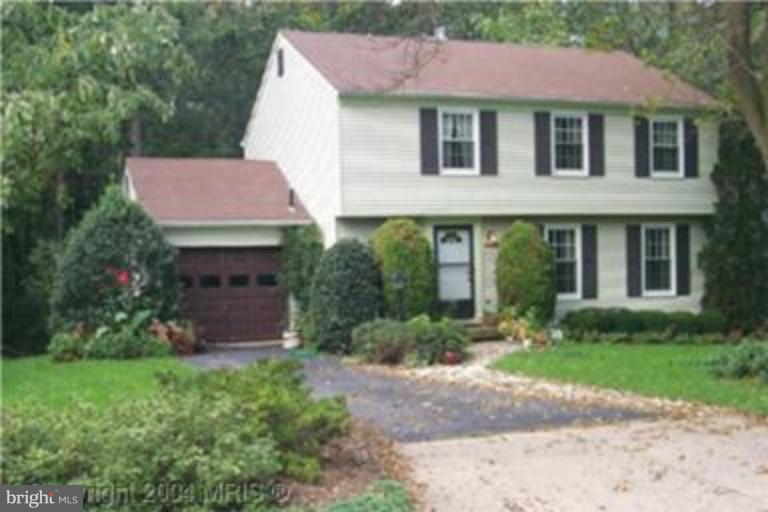 12269 Angel Wing Court Reston, VA 20191 - Photo 1 of 1 a view of a house with a yard and a garden