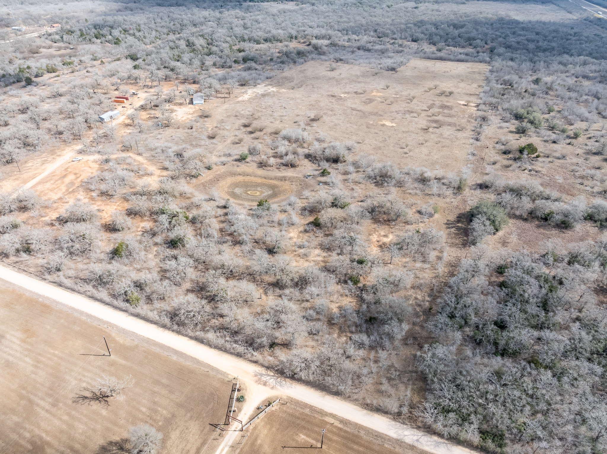 424 County Road 424 Waelder, TX 78959 - Photo 14 of 30 a view of a dry yard with wooden stairs