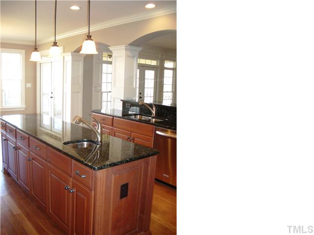 3610 Forward Way, Unit L2781 Raleigh, NC 27614 - Photo 6 of 12 Open Design with the Kitchen and Breakfast rooms overlooking into the Family Room through the elegant arched cased openings!