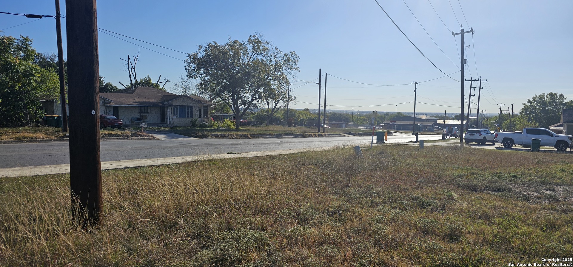 809 Toepperwein Road Converse, TX 78109 - Photo 3 of 4 a view of a house with a yard