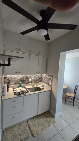 a view of a storage & utility room with closet