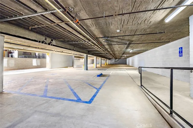 a view of a house with wooden fence
