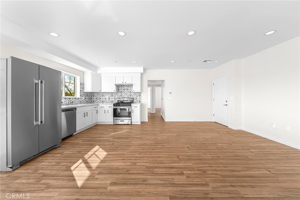 5639 Huntington Drive, Unit 1 Los Angeles, CA 90032 - Photo 8 of 25 a view of kitchen with wooden floor