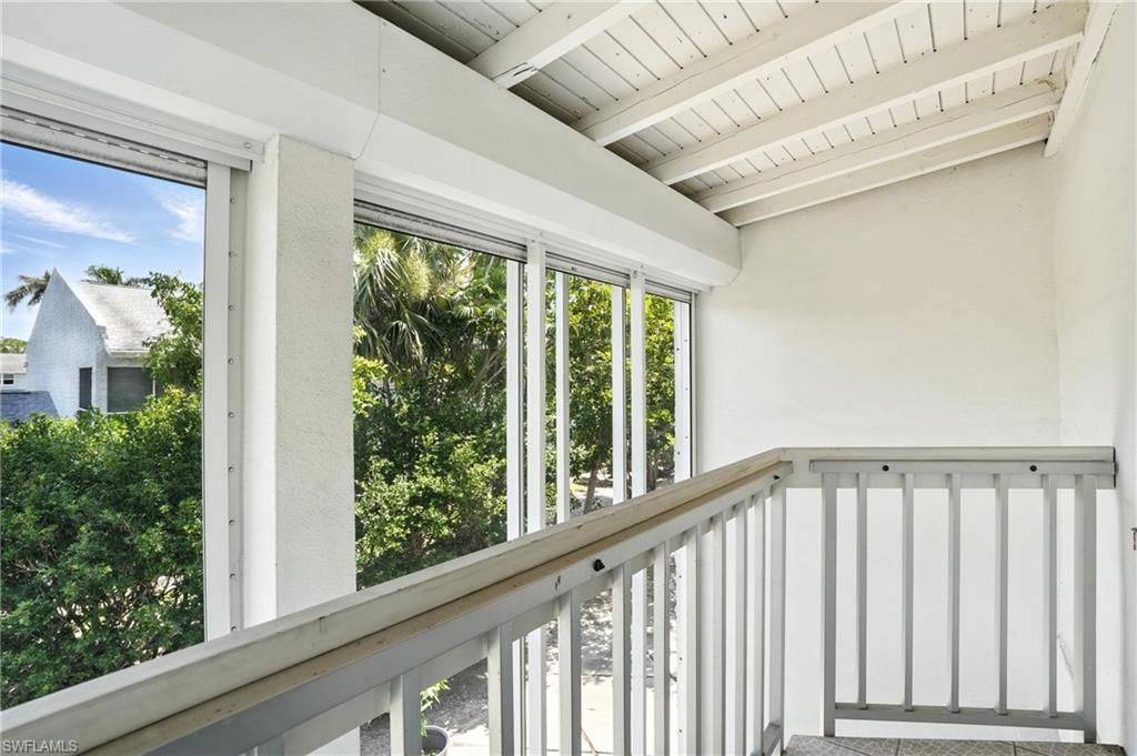 14 Watercolor Way, Unit 14 Naples, FL 34113 - Photo 19 of 37 a view of staircase with window