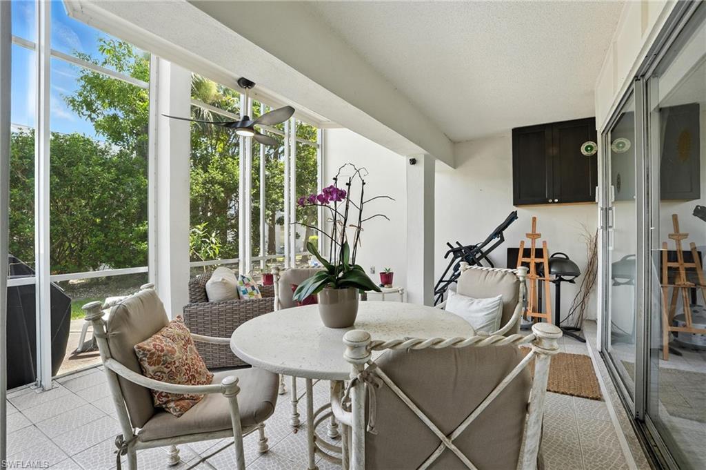 14 Watercolor Way, Unit 14 Naples, FL 34113 - Photo 26 of 37 a view of a dining room with furniture window and outside view