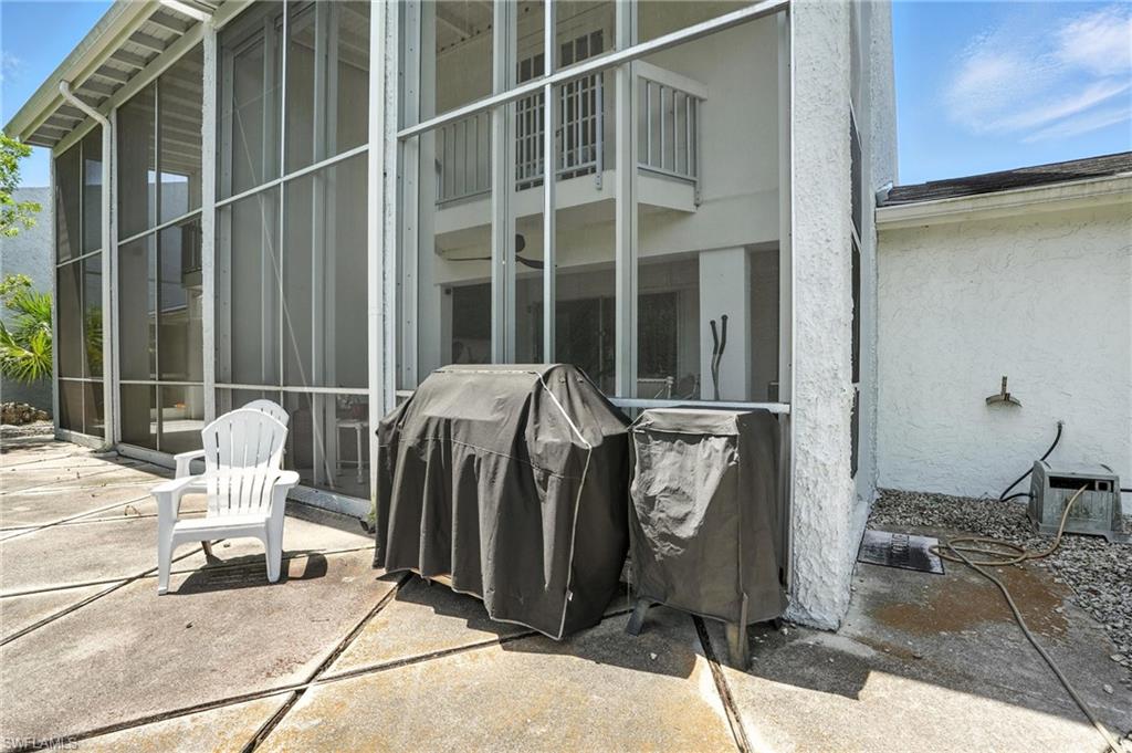14 Watercolor Way, Unit 14 Naples, FL 34113 - Photo 29 of 37 a view of balcony and patio