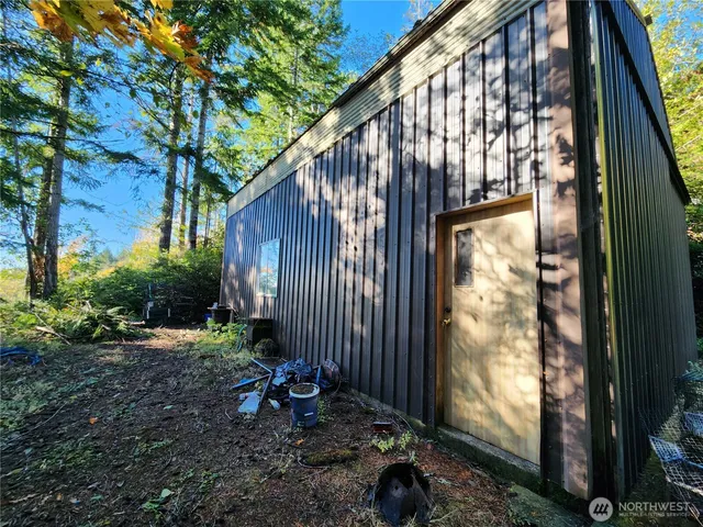 a backyard of a house with lots of green space