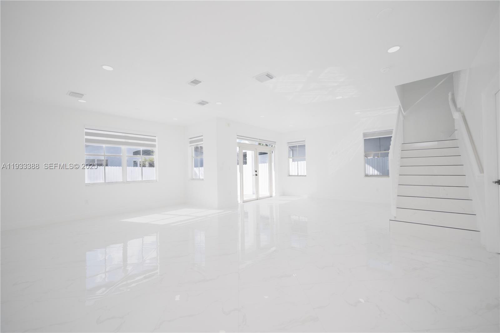 15486 Southwest 23rd Lane Miami, FL 33185 - Photo 12 of 24 a view of an empty room with a window