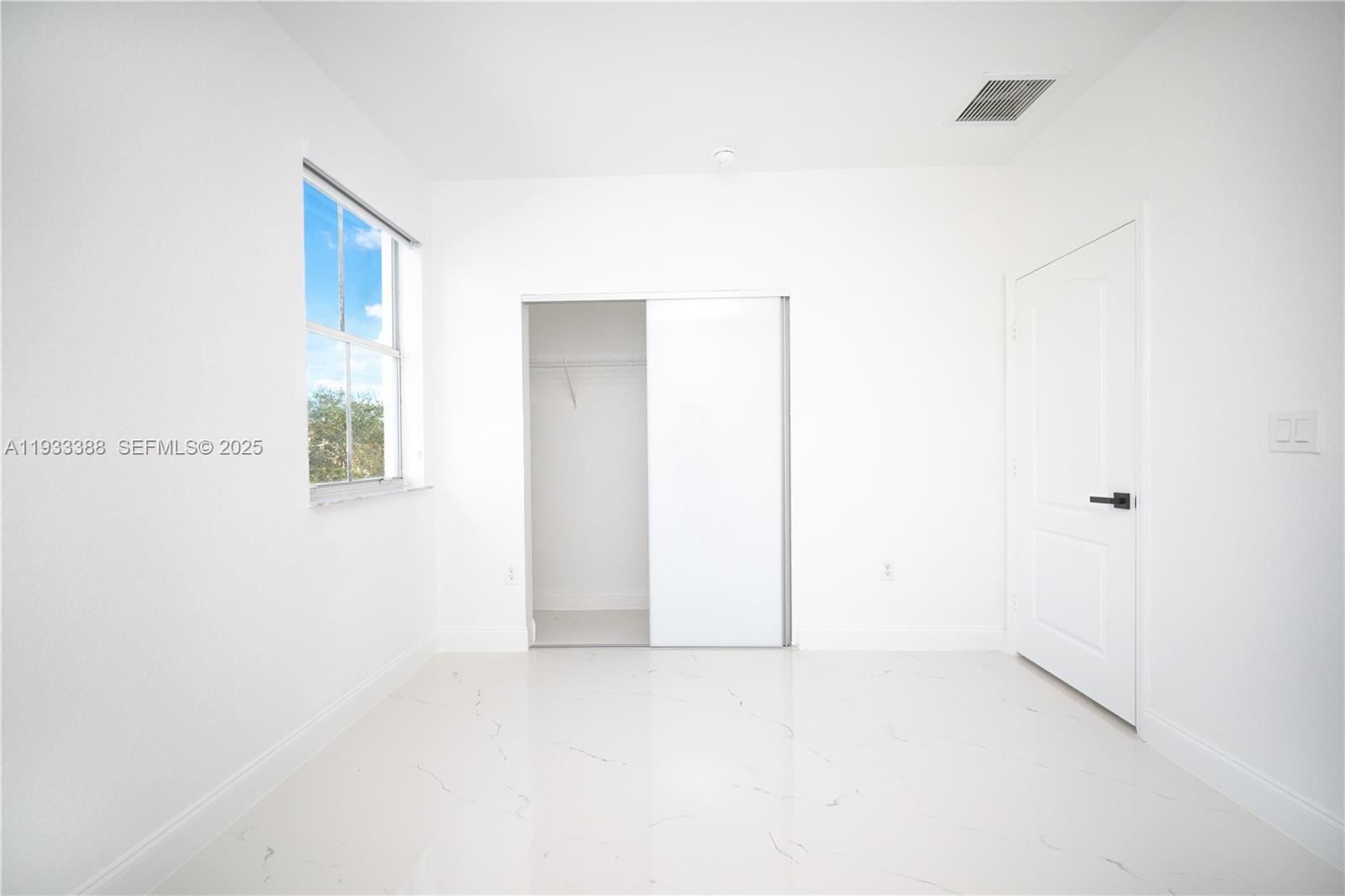 15486 Southwest 23rd Lane Miami, FL 33185 - Photo 19 of 24 a view of an empty room