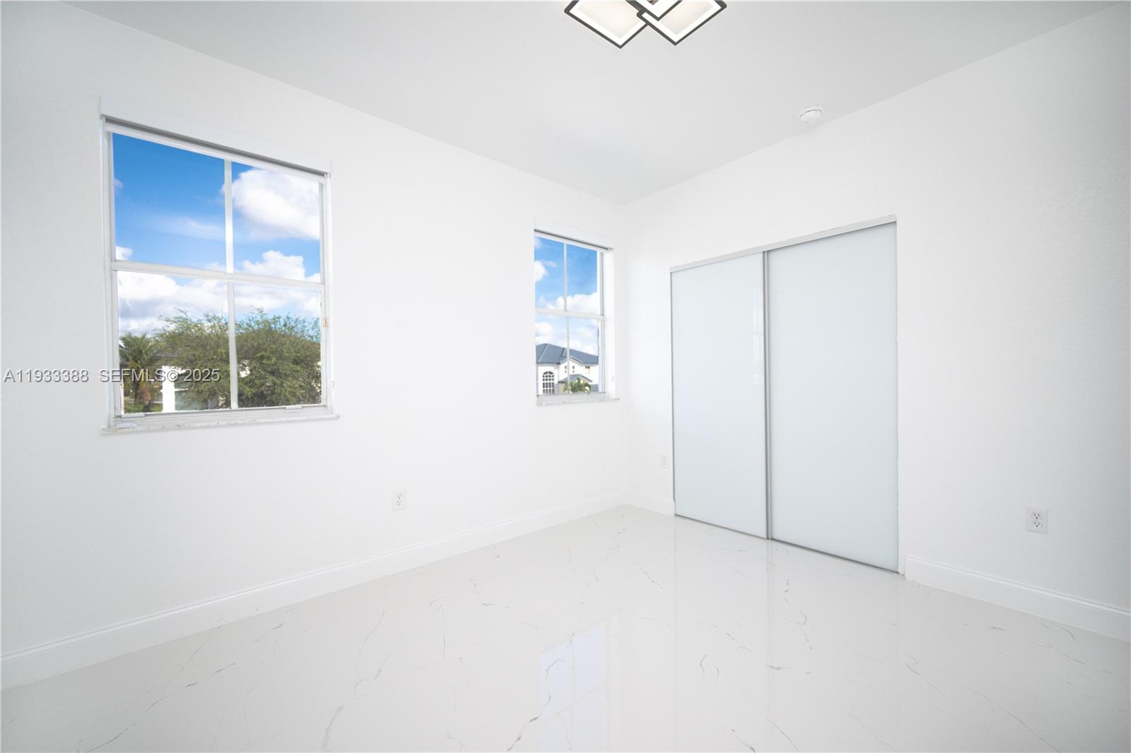 15486 Southwest 23rd Lane Miami, FL 33185 - Photo 20 of 24 an empty room with windows
