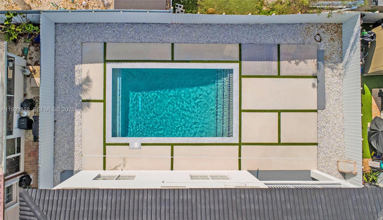 15486 Southwest 23rd Lane Miami, FL 33185 - Photo 4 of 24 a view of a house with a balcony