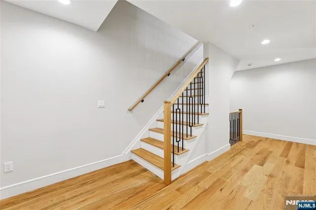 a view of a hallway with staircase