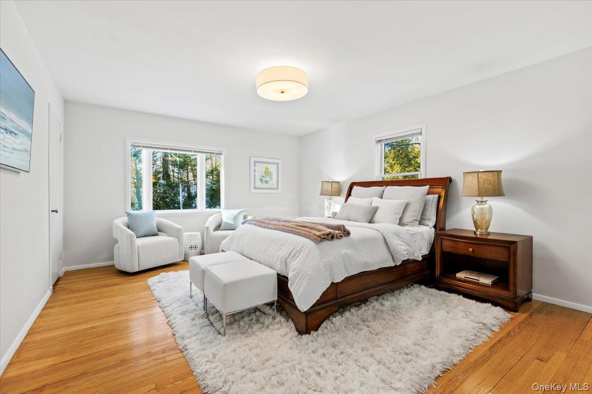 196 Old Army Road Scarsdale, NY 10583 - Photo 10 of 33 a bedroom with bed and a couch