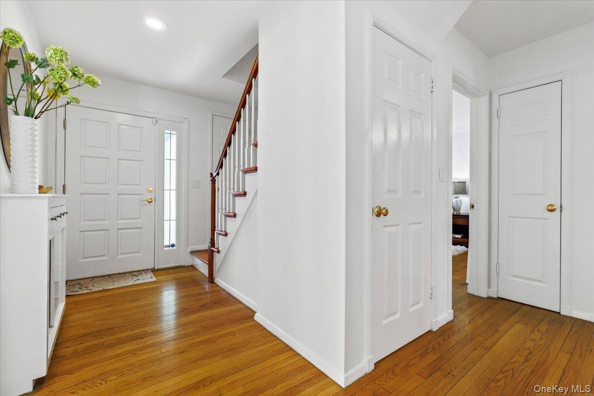 196 Old Army Road Scarsdale, NY 10583 - Photo 13 of 33 a view of an entryway with wooden floor