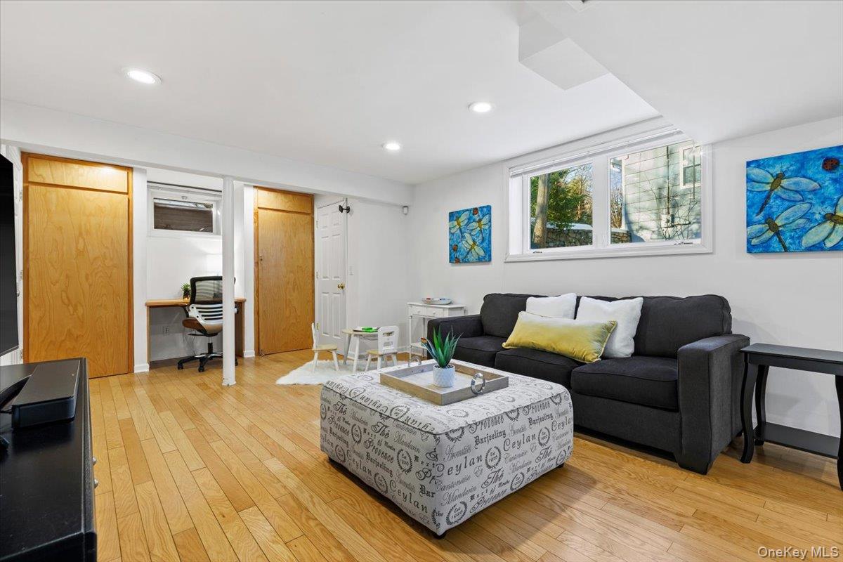 196 Old Army Road Scarsdale, NY 10583 - Photo 17 of 33 a living room with furniture and a large window