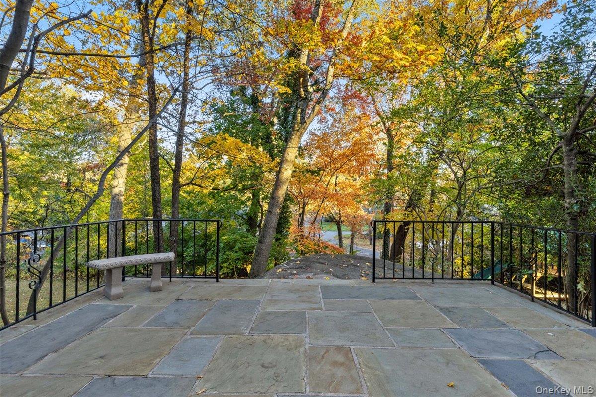 196 Old Army Road Scarsdale, NY 10583 - Photo 25 of 33 a view of backyard with seating area and trees