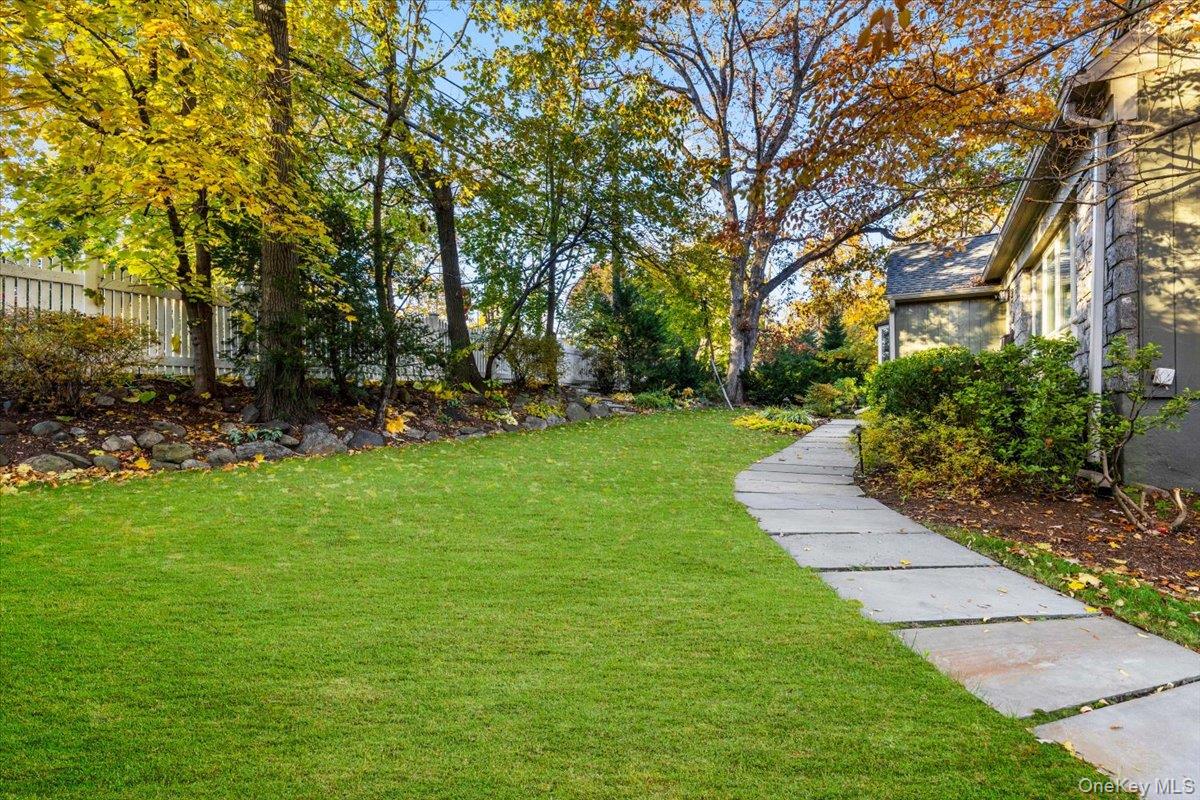 196 Old Army Road Scarsdale, NY 10583 - Photo 27 of 33 a view of a backyard with large trees