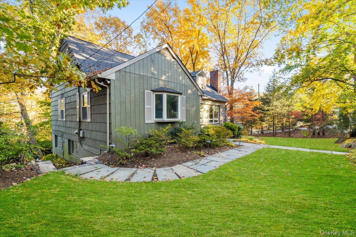 196 Old Army Road Scarsdale, NY 10583 - Photo 3 of 14 View of side of home walkway from the front to backyard.