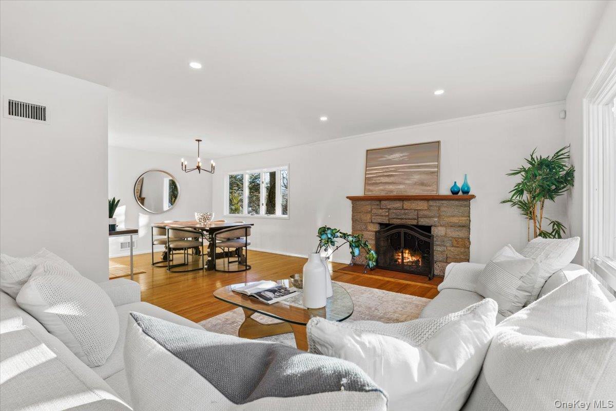 196 Old Army Road Scarsdale, NY 10583 - Photo 4 of 33 a living room with furniture and a fireplace