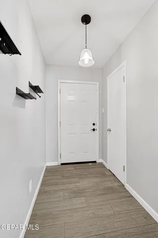 a view of an empty room with a sink