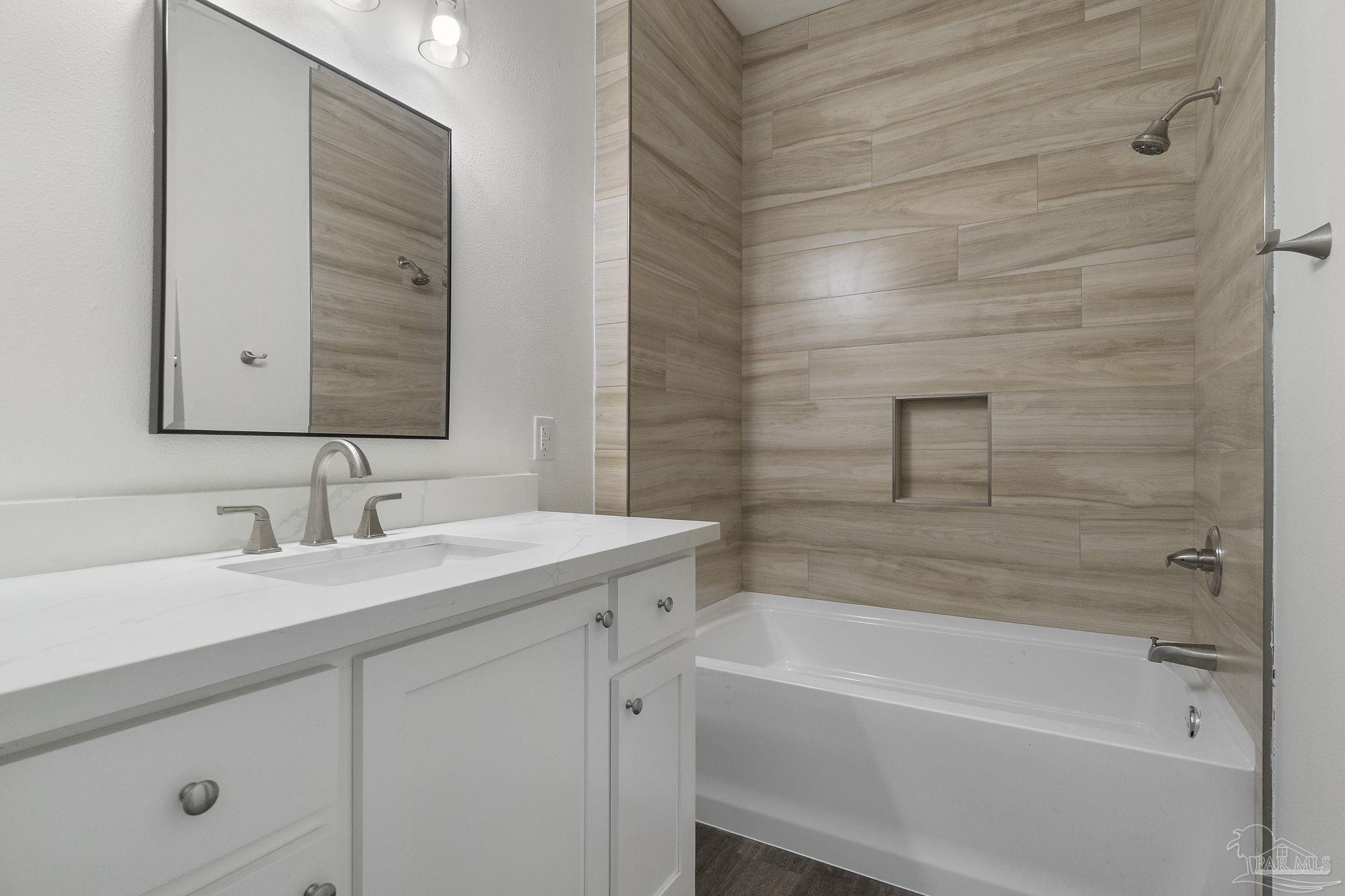 800 Shadow Ridge Drive Pensacola, FL 32514 - Photo 17 of 66 a bathroom with a sink and a bathtub