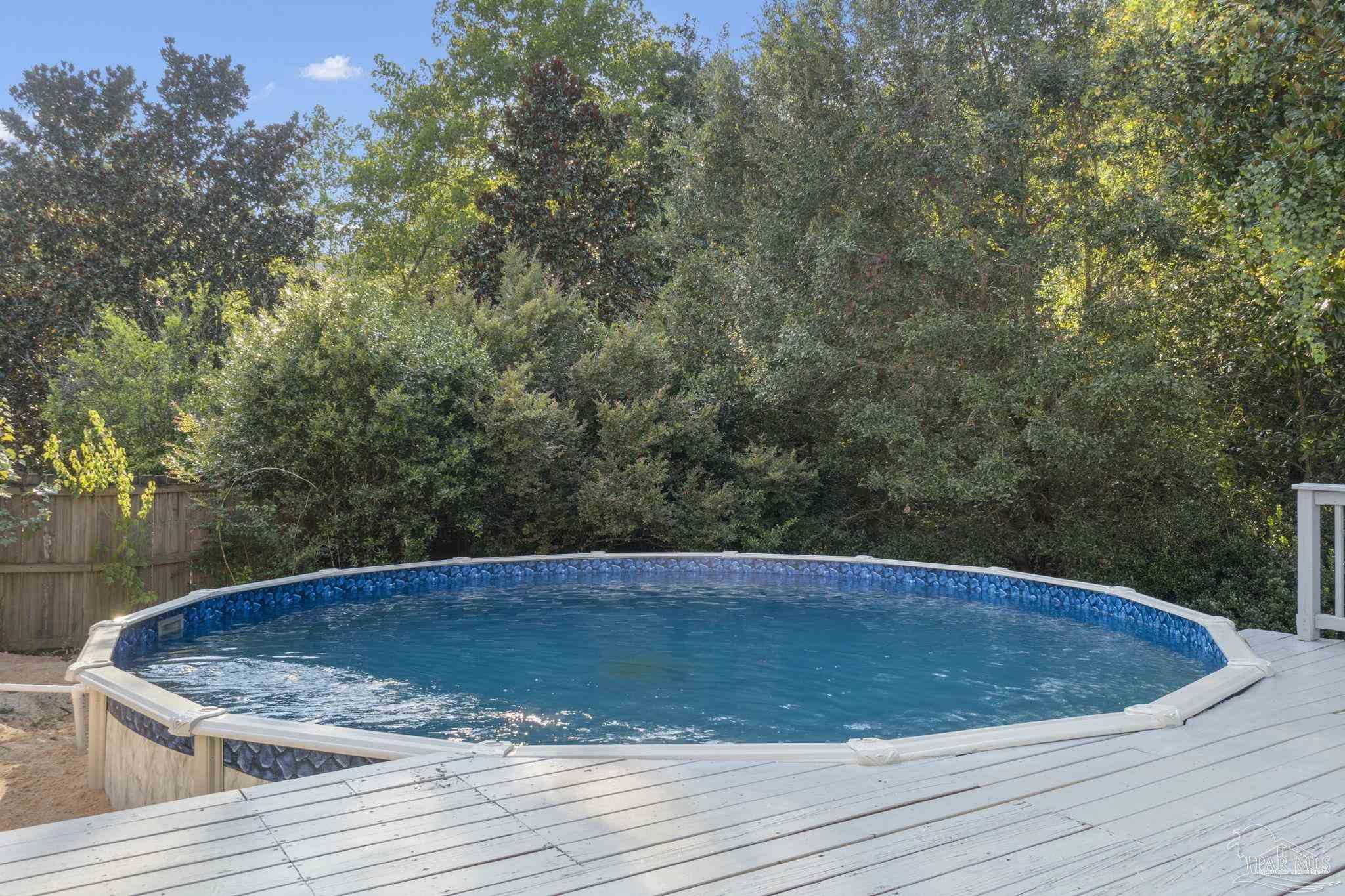 800 Shadow Ridge Drive Pensacola, FL 32514 - Photo 60 of 66 a view of a swimming pool with a yard