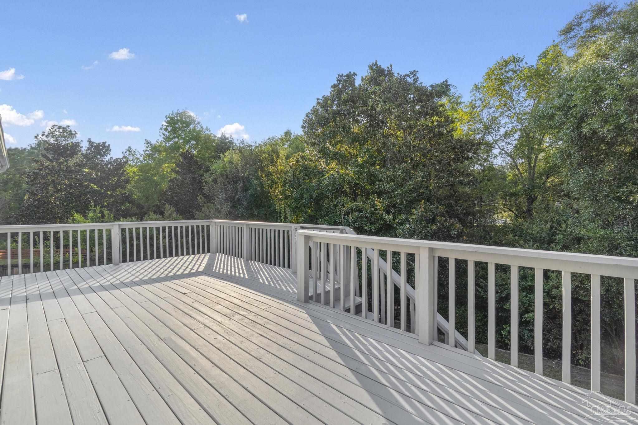 800 Shadow Ridge Drive Pensacola, FL 32514 - Photo 62 of 66 a balcony with wooden floor and fence