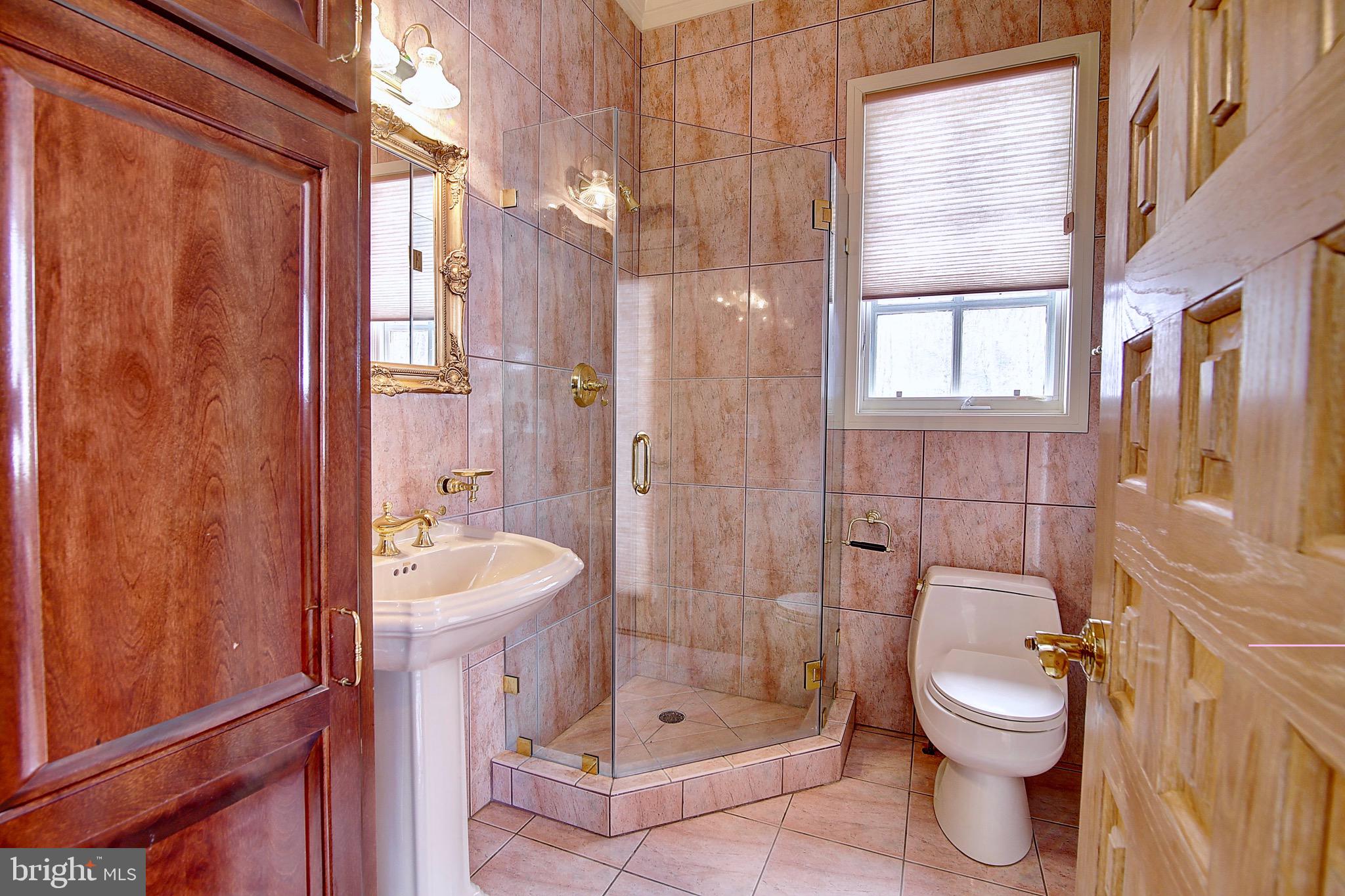 2180 Hunter Mill Road Vienna, VA 22181 - Photo 21 of 44 Separate Pool Bathroom with outside pool access