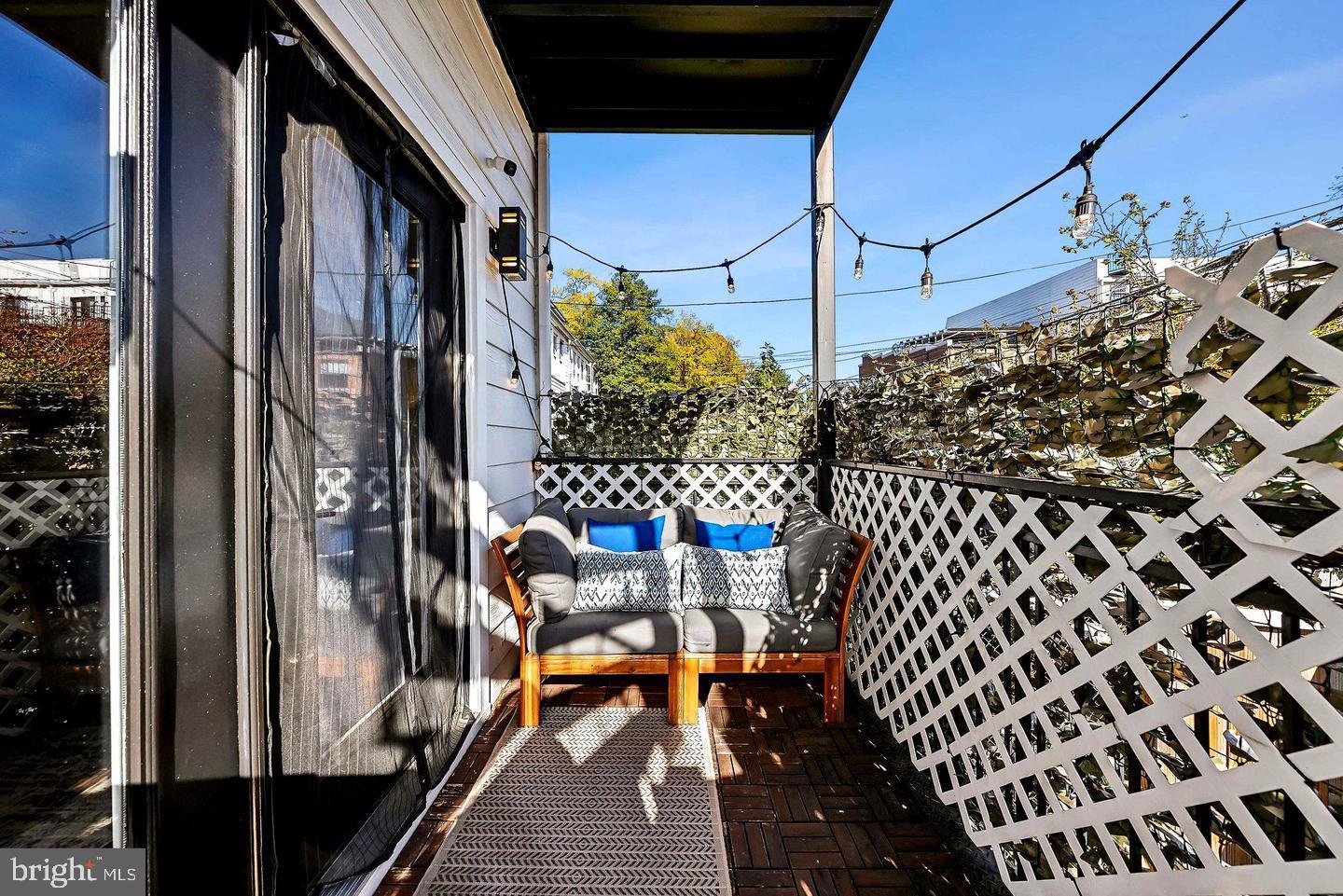 1213 Holbrook Street Northeast, Unit 1 Washington, DC 20002 - Photo 9 of 26 a balcony view with couple of chairs