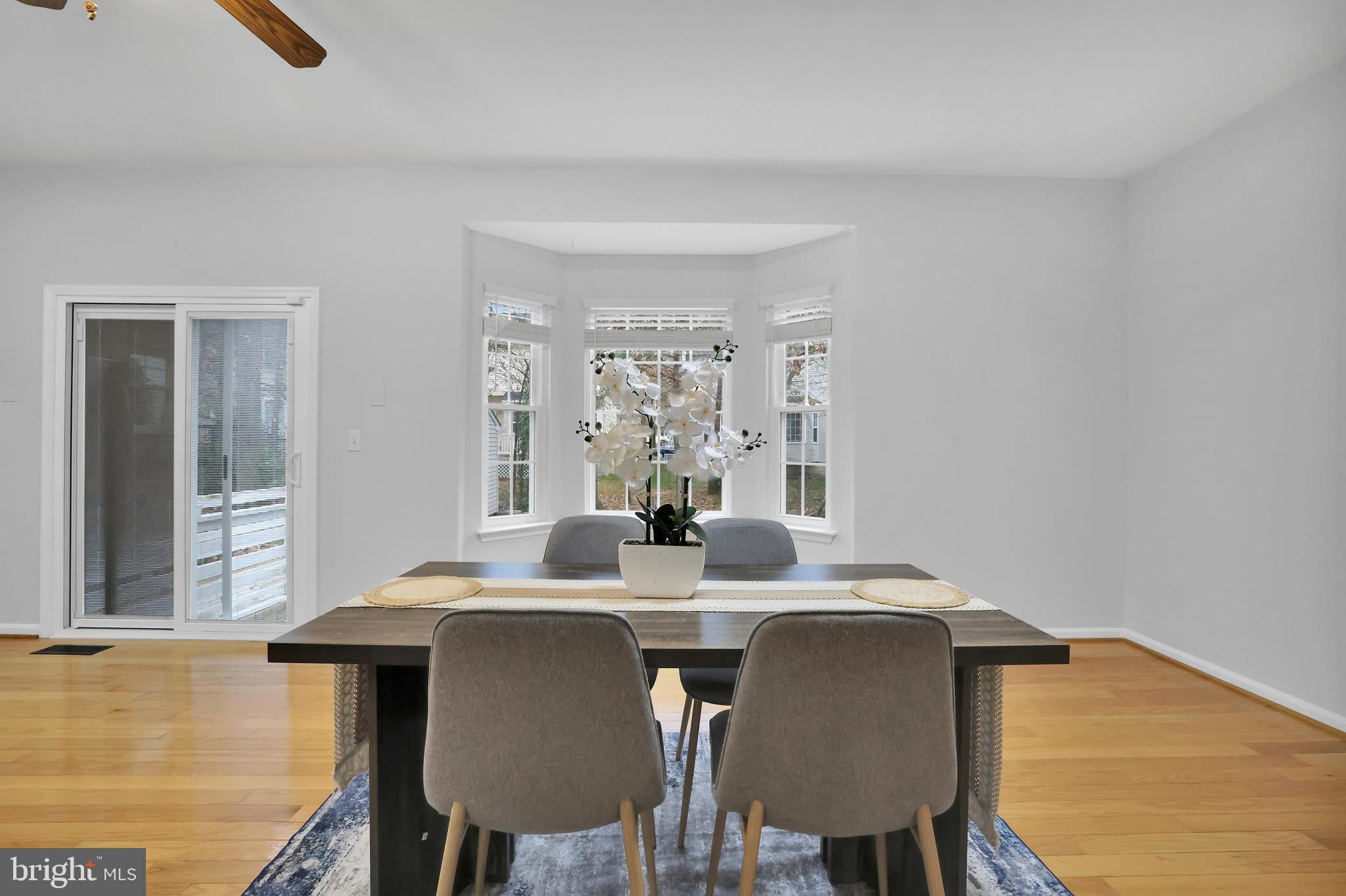 126 Myrtle Avenue Severn, MD 21144 - Photo 12 of 52 a view of a dining room with furniture and window