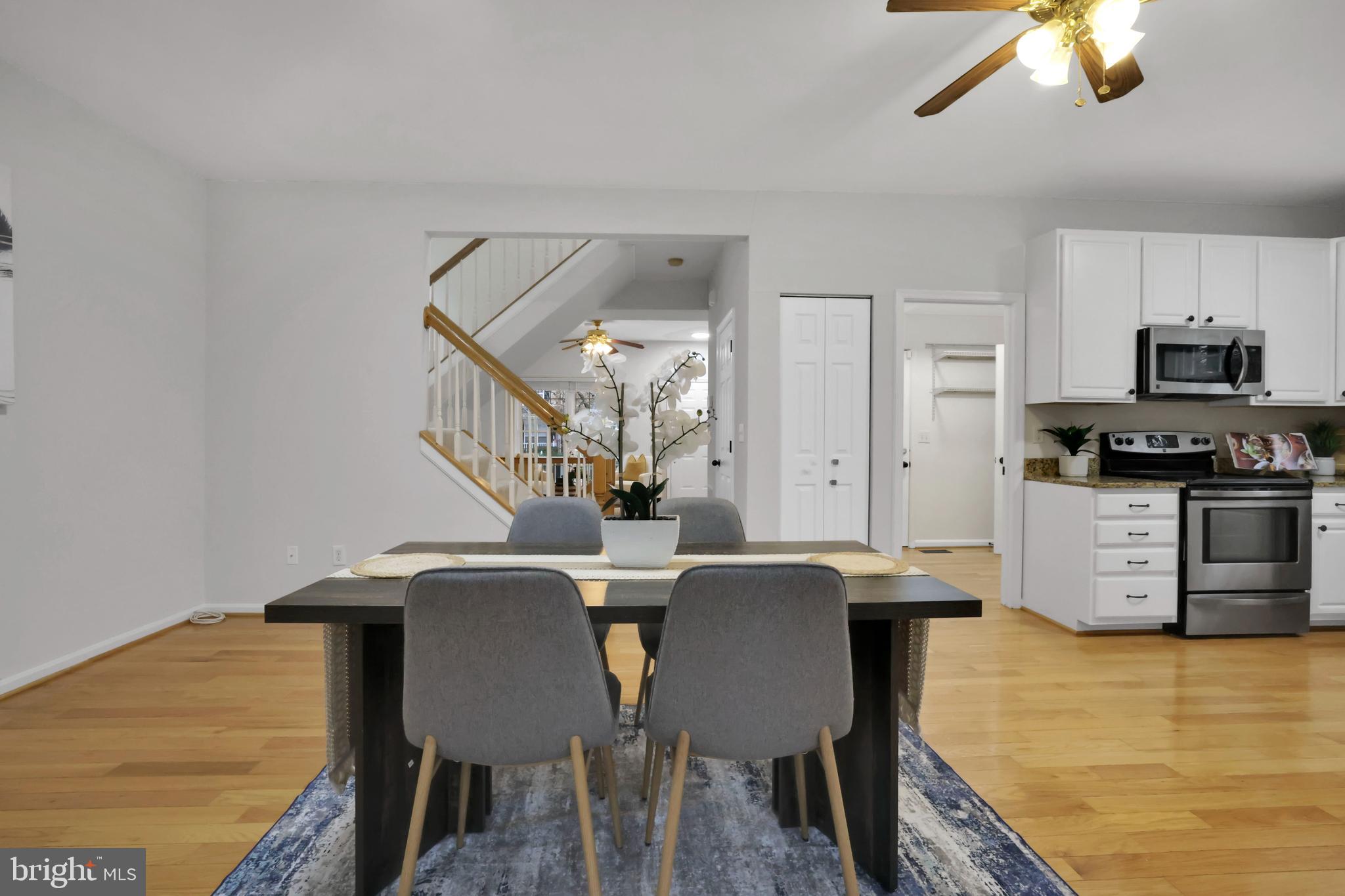 126 Myrtle Avenue Severn, MD 21144 - Photo 13 of 52 a view of a dining room with furniture and wooden floor