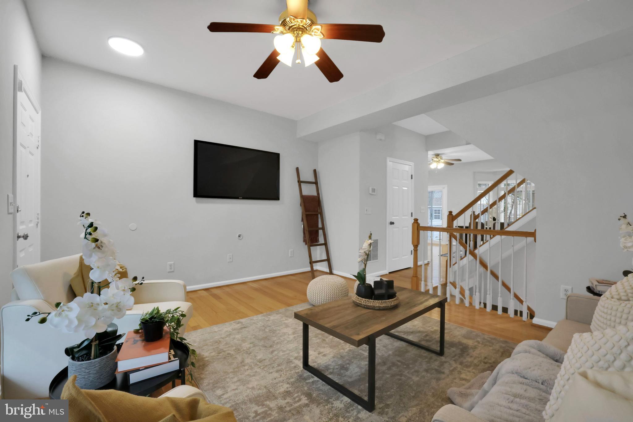 126 Myrtle Avenue Severn, MD 21144 - Photo 17 of 52 a living room with furniture and a flat screen tv