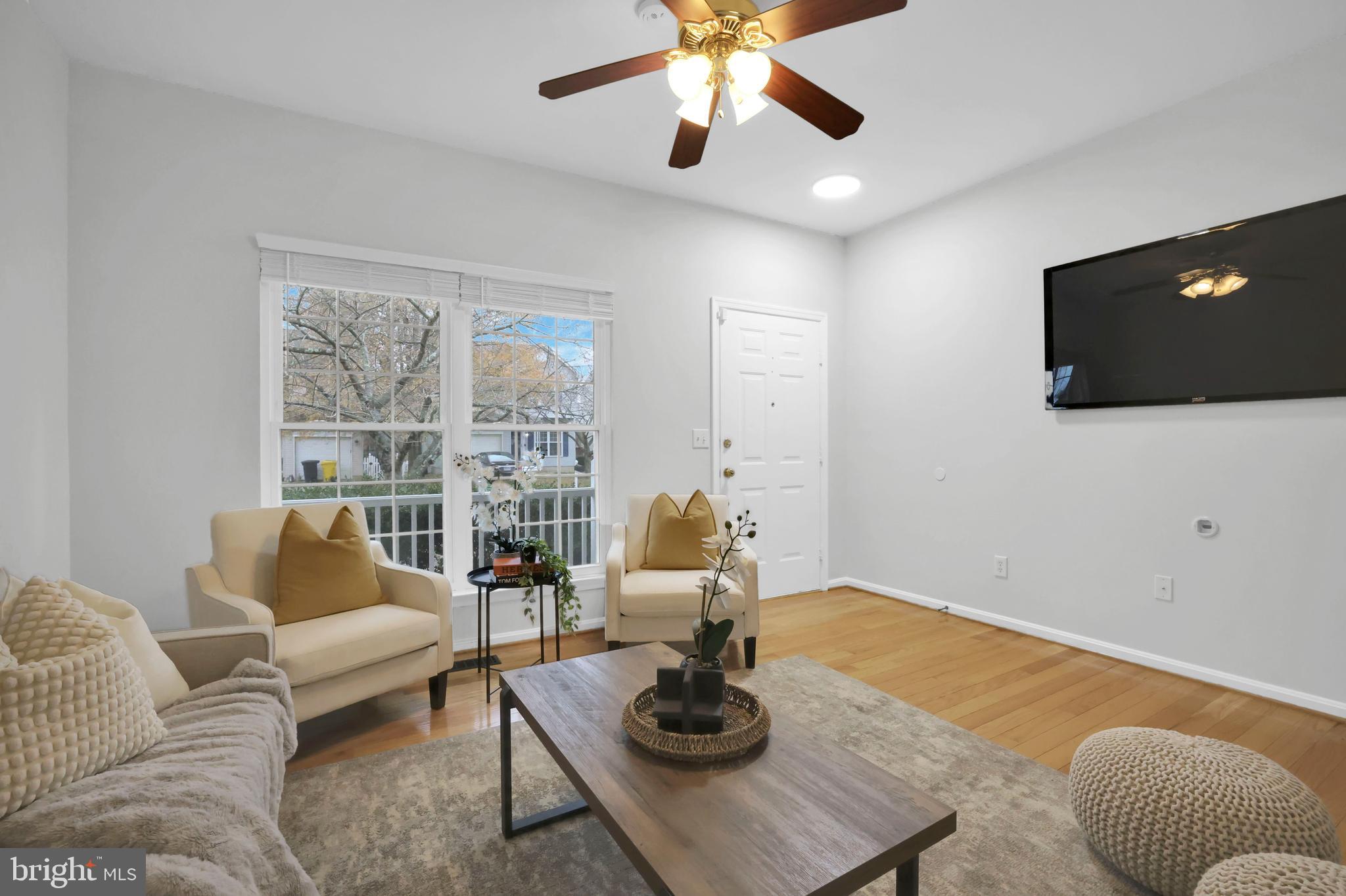126 Myrtle Avenue Severn, MD 21144 - Photo 18 of 52 a living room with furniture and a flat screen tv