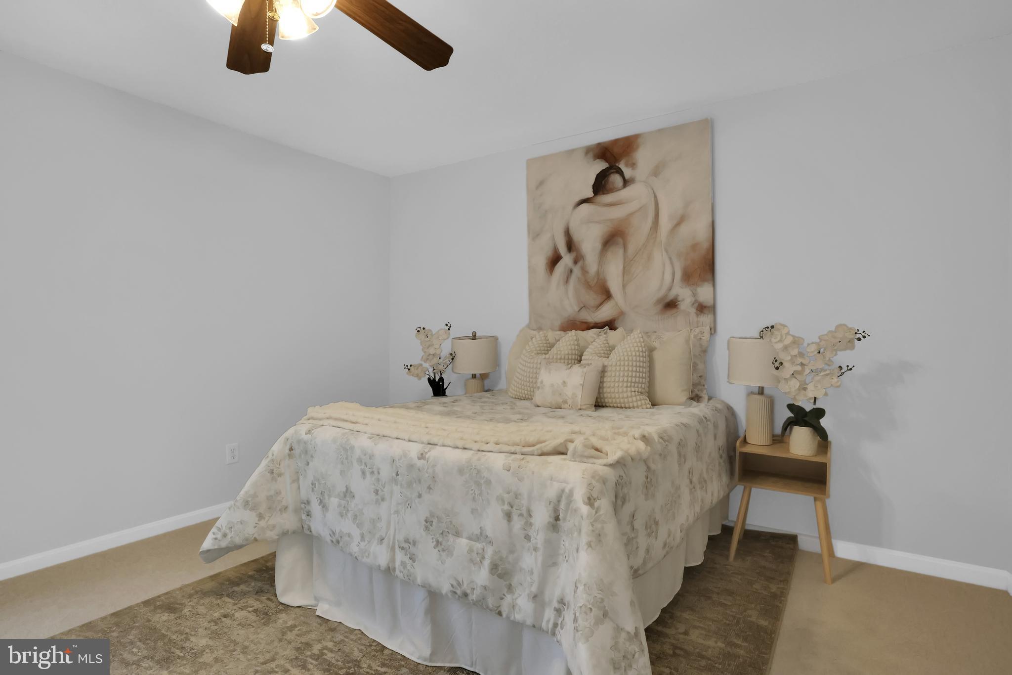 126 Myrtle Avenue Severn, MD 21144 - Photo 19 of 52 a bedroom with a bed and painting on the wall