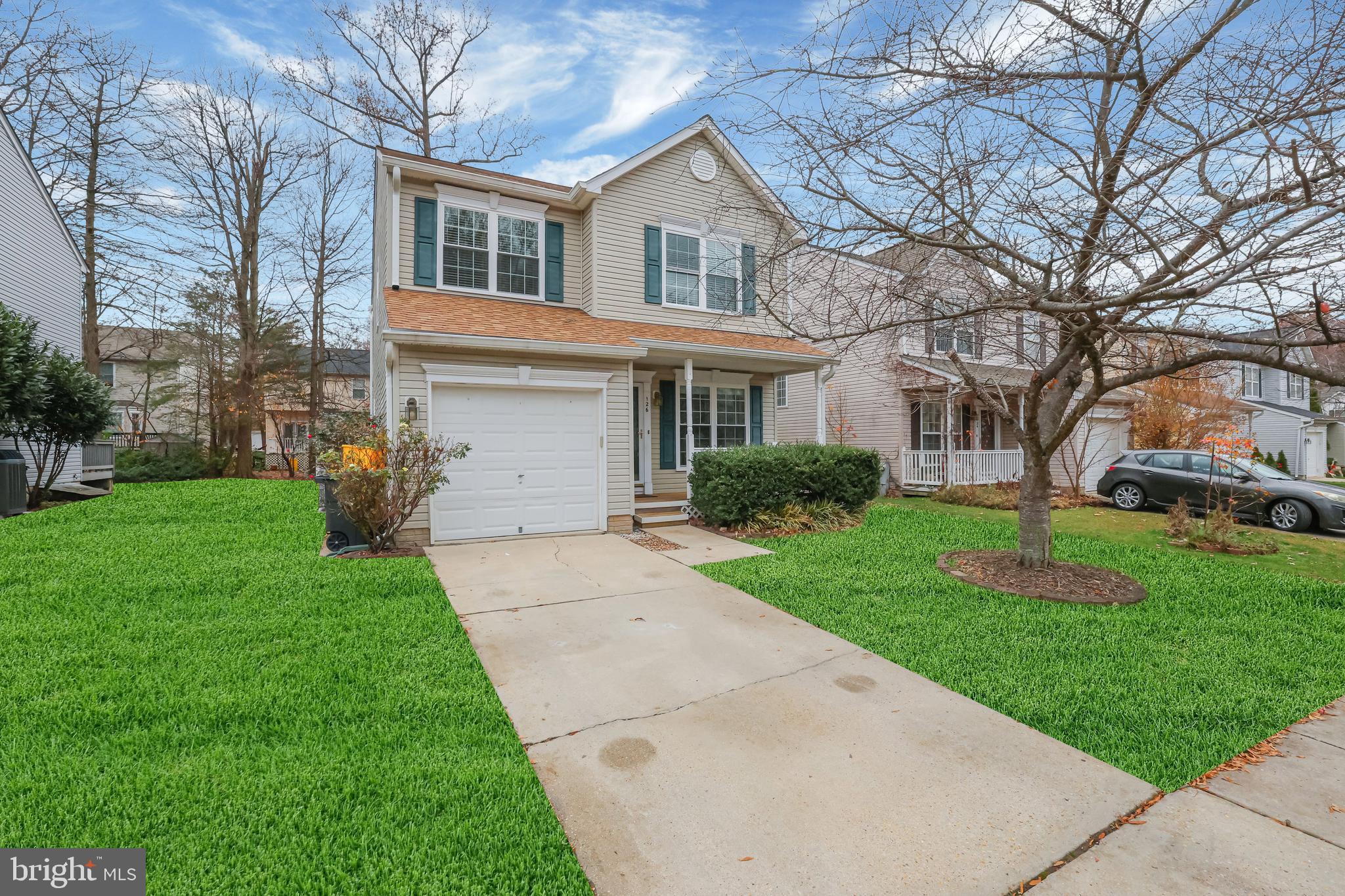 126 Myrtle Avenue Severn, MD 21144 - Photo 2 of 52 a front view of house with yard and green space