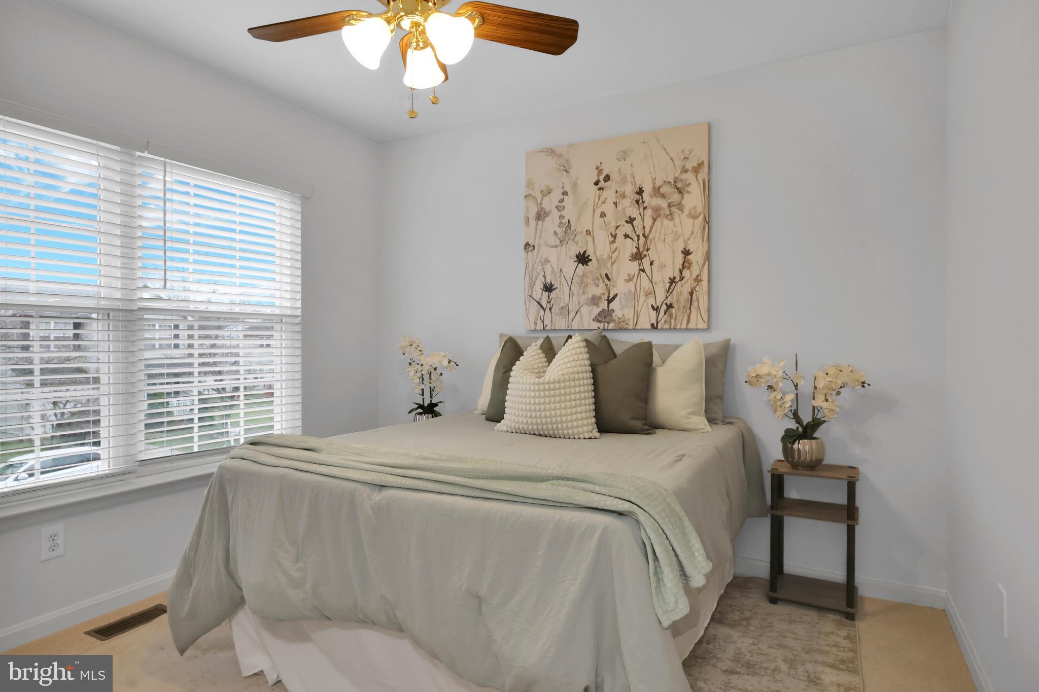 126 Myrtle Avenue Severn, MD 21144 - Photo 29 of 52 a bedroom with a bed and a window