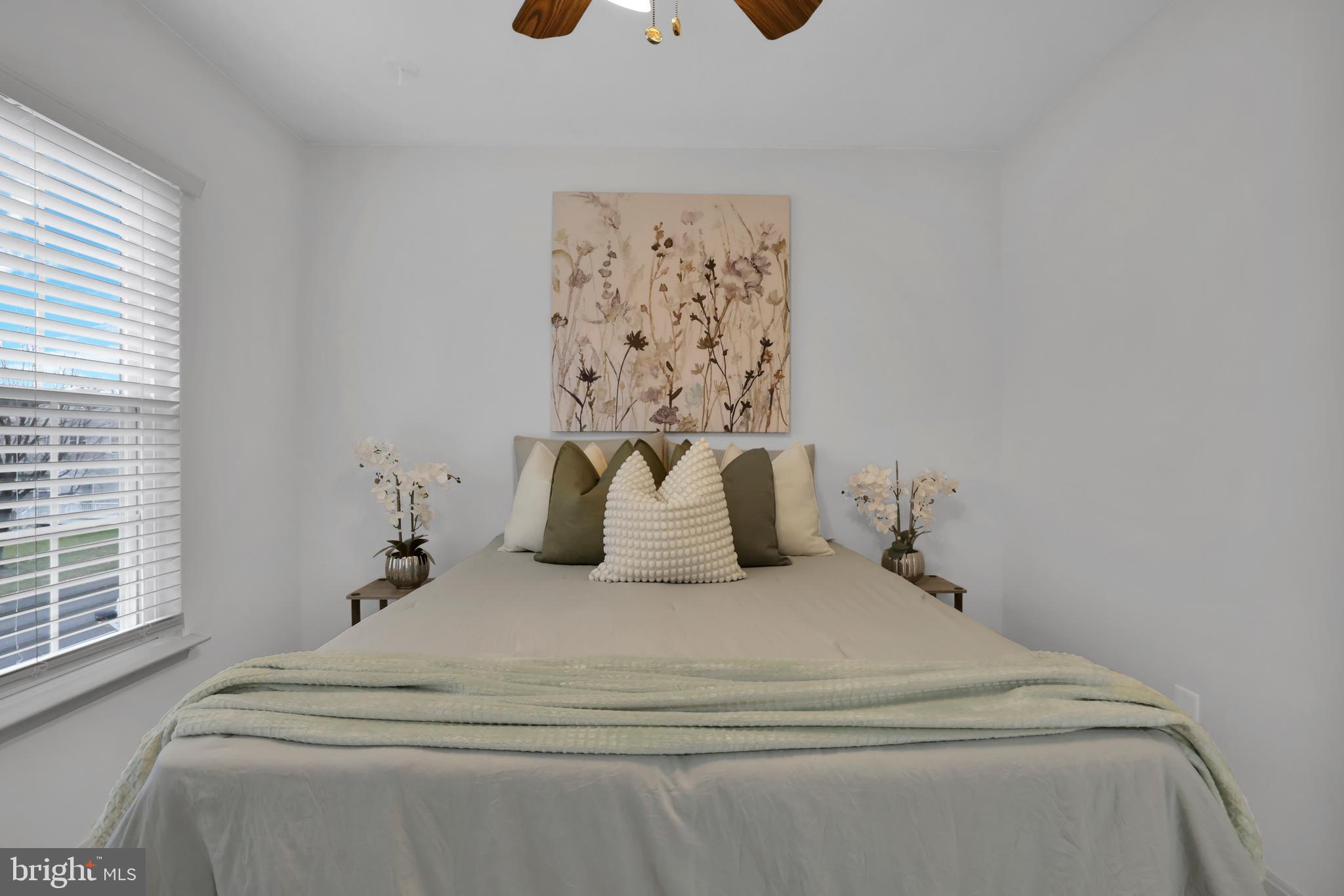 126 Myrtle Avenue Severn, MD 21144 - Photo 30 of 52 a bathroom with a bathtub and a window