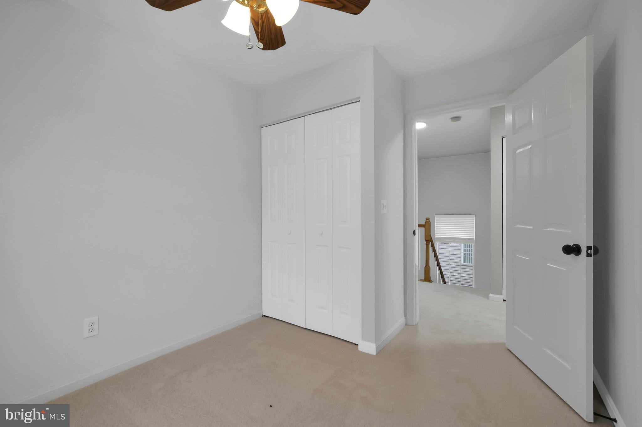 126 Myrtle Avenue Severn, MD 21144 - Photo 35 of 52 a view of a room with a empty space and chandelier fan