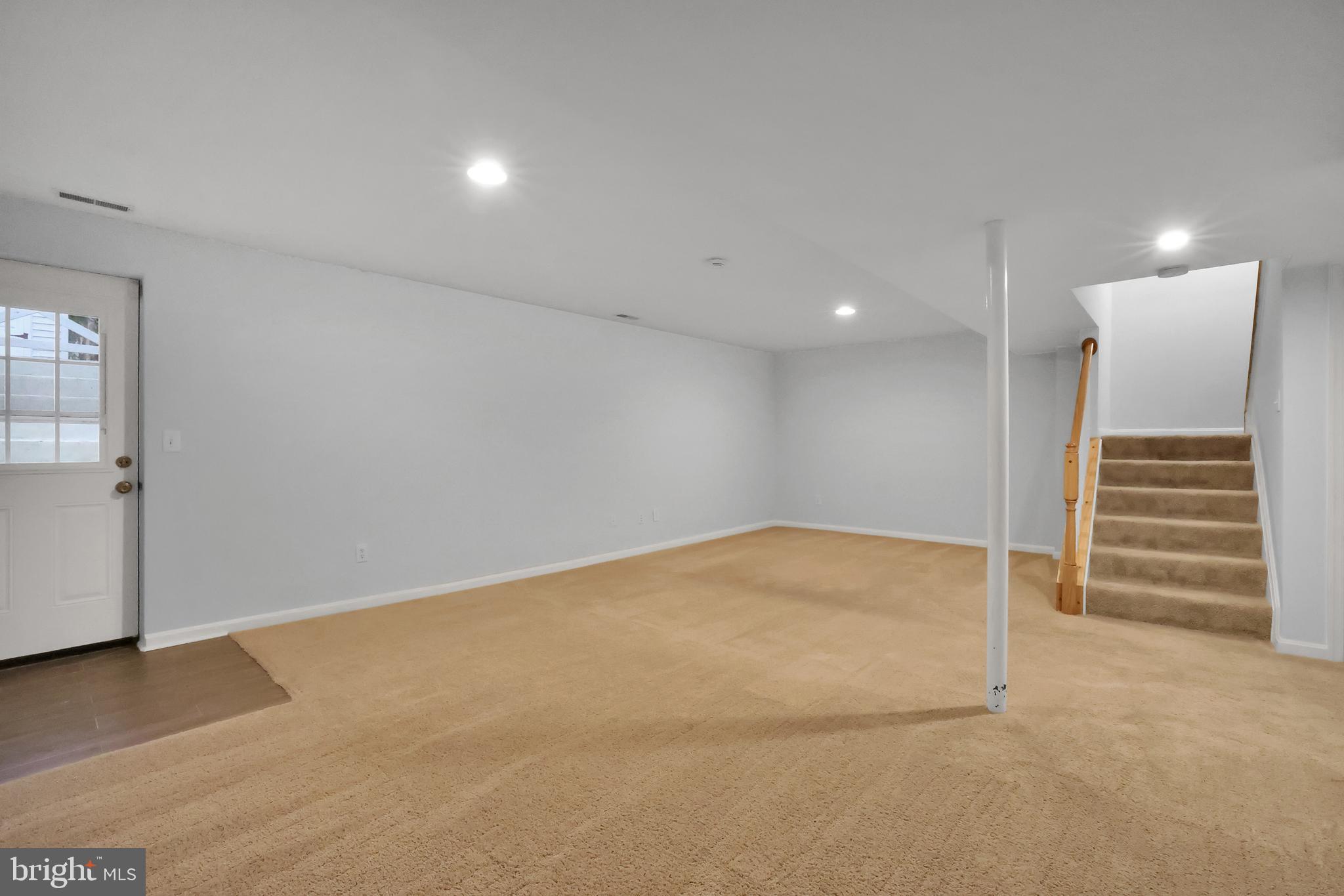 126 Myrtle Avenue Severn, MD 21144 - Photo 41 of 52 a view of an empty room with a kitchen