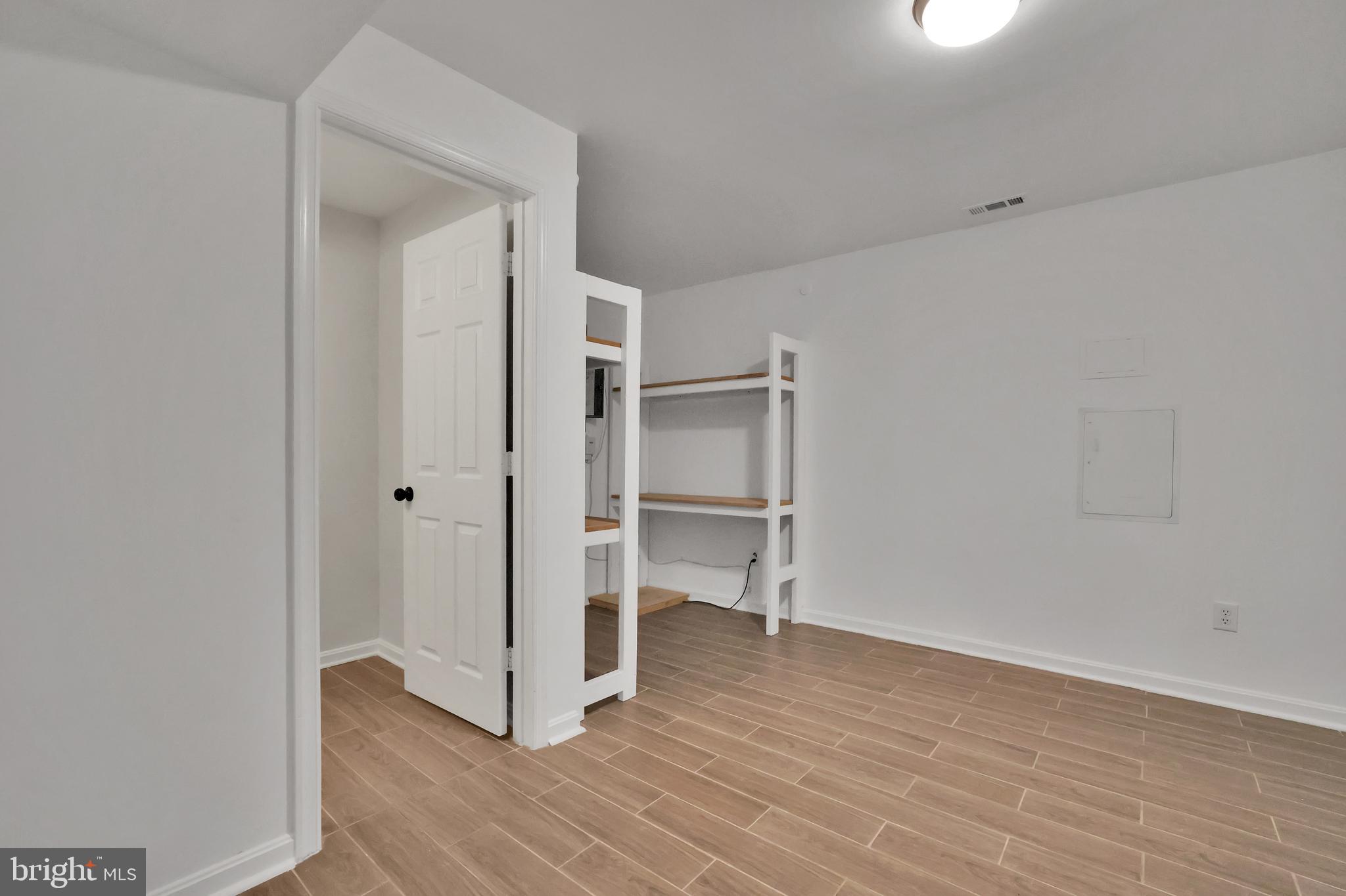 126 Myrtle Avenue Severn, MD 21144 - Photo 45 of 52 a view of empty room with wooden floor