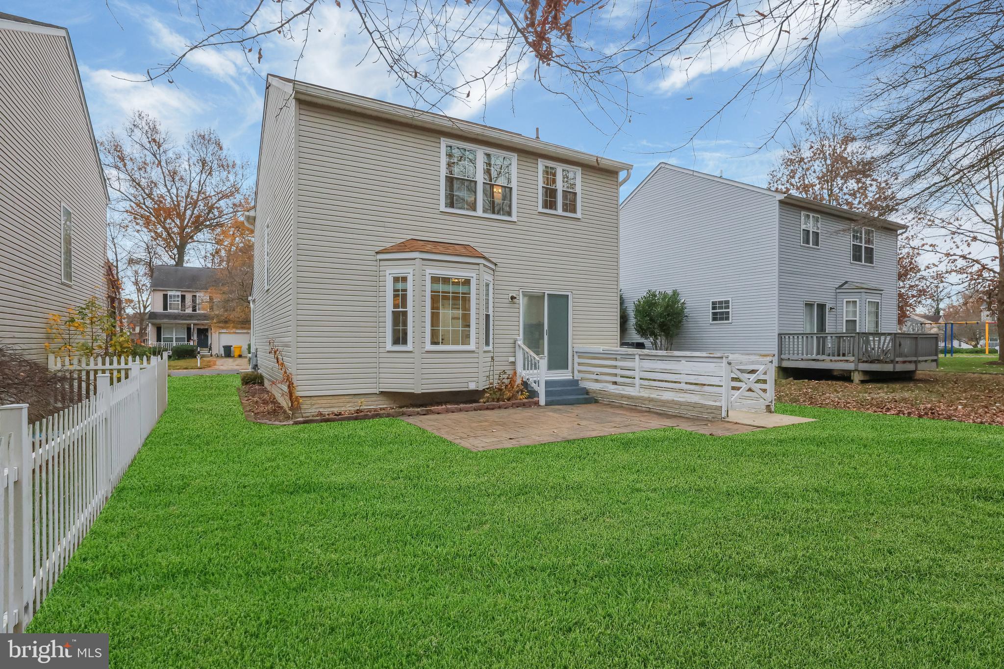 126 Myrtle Avenue Severn, MD 21144 - Photo 49 of 52 a front view of a house with a yard and trees