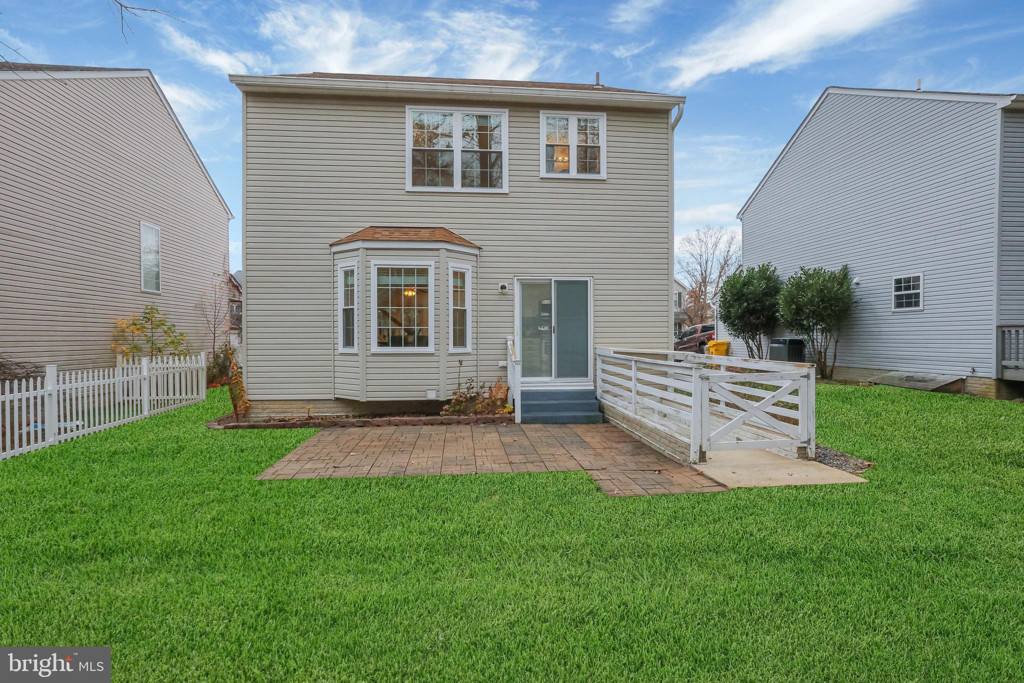 126 Myrtle Avenue Severn, MD 21144 - Photo 50 of 52 a view of a house with a yard and sitting area