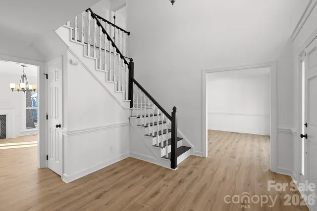 a view of entryway with wooden floor