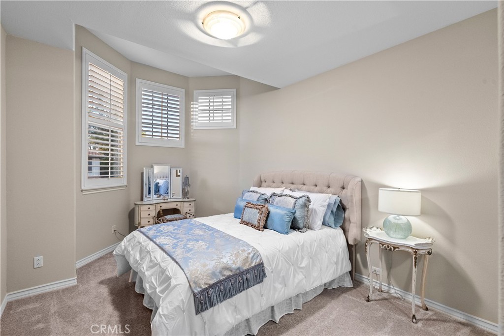 23930 Lakeside Road Valencia, CA 91355 - Photo 34 of 72 a bedroom with a bed and a window