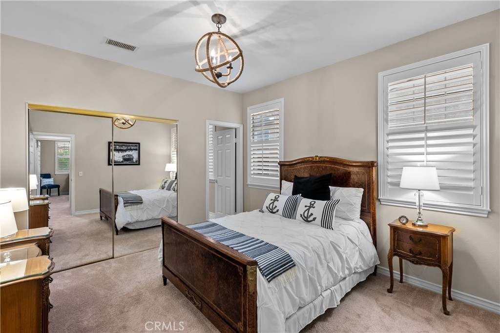 23930 Lakeside Road Valencia, CA 91355 - Photo 36 of 72 a bedroom with a bed and window