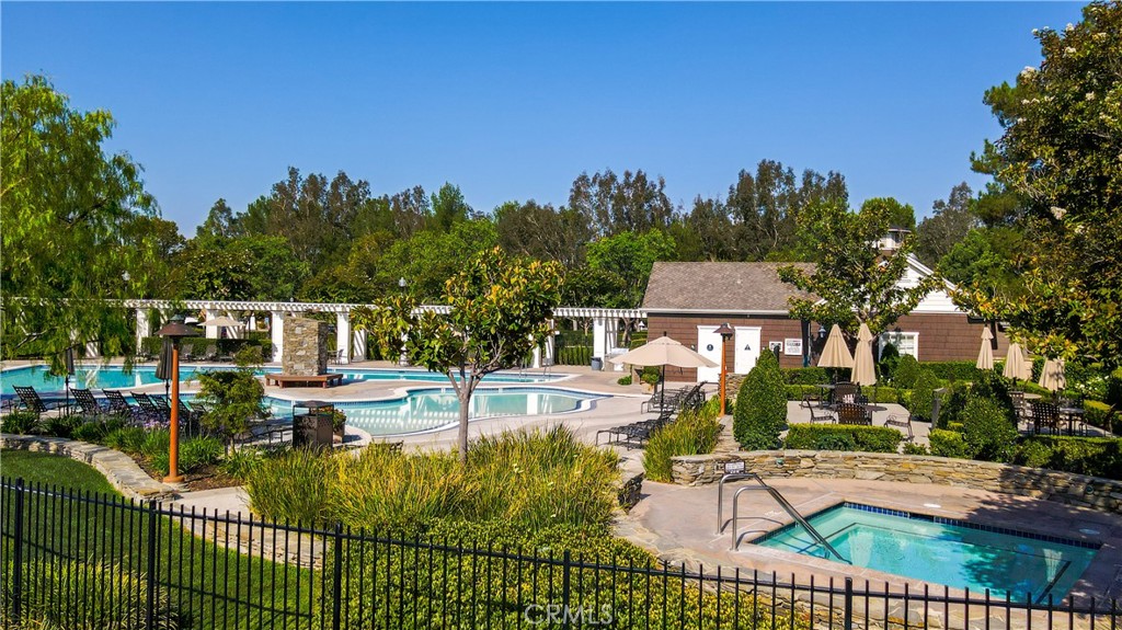 23930 Lakeside Road Valencia, CA 91355 - Photo 64 of 72 a view of a house with outdoor space and sitting area