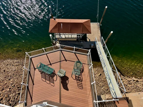 a view of a terrace with seating area and furniture
