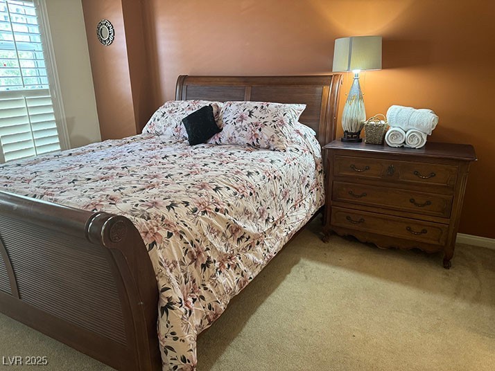 2405 East Serene Avenue, Unit 241 Las Vegas, NV 89123 - Photo 13 of 17 Carpeted bedroom with baseboards