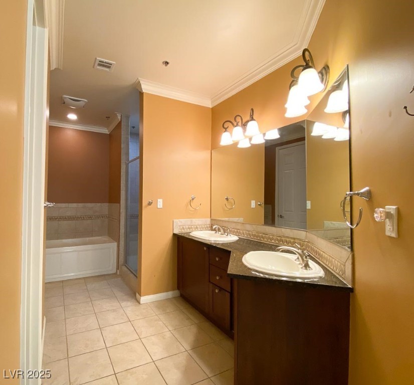 2405 East Serene Avenue, Unit 241 Las Vegas, NV 89123 - Photo 14 of 17 Bathroom featuring tile patterned floors, crown mo